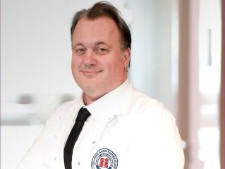 Doç.Dr. Doğan Güçlühan Güçlü